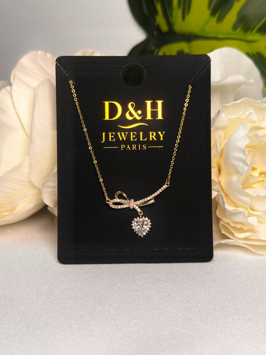 💎 Collier Doré Cœur Cristal & Nœud Élégant – D&H Jewelry Paris