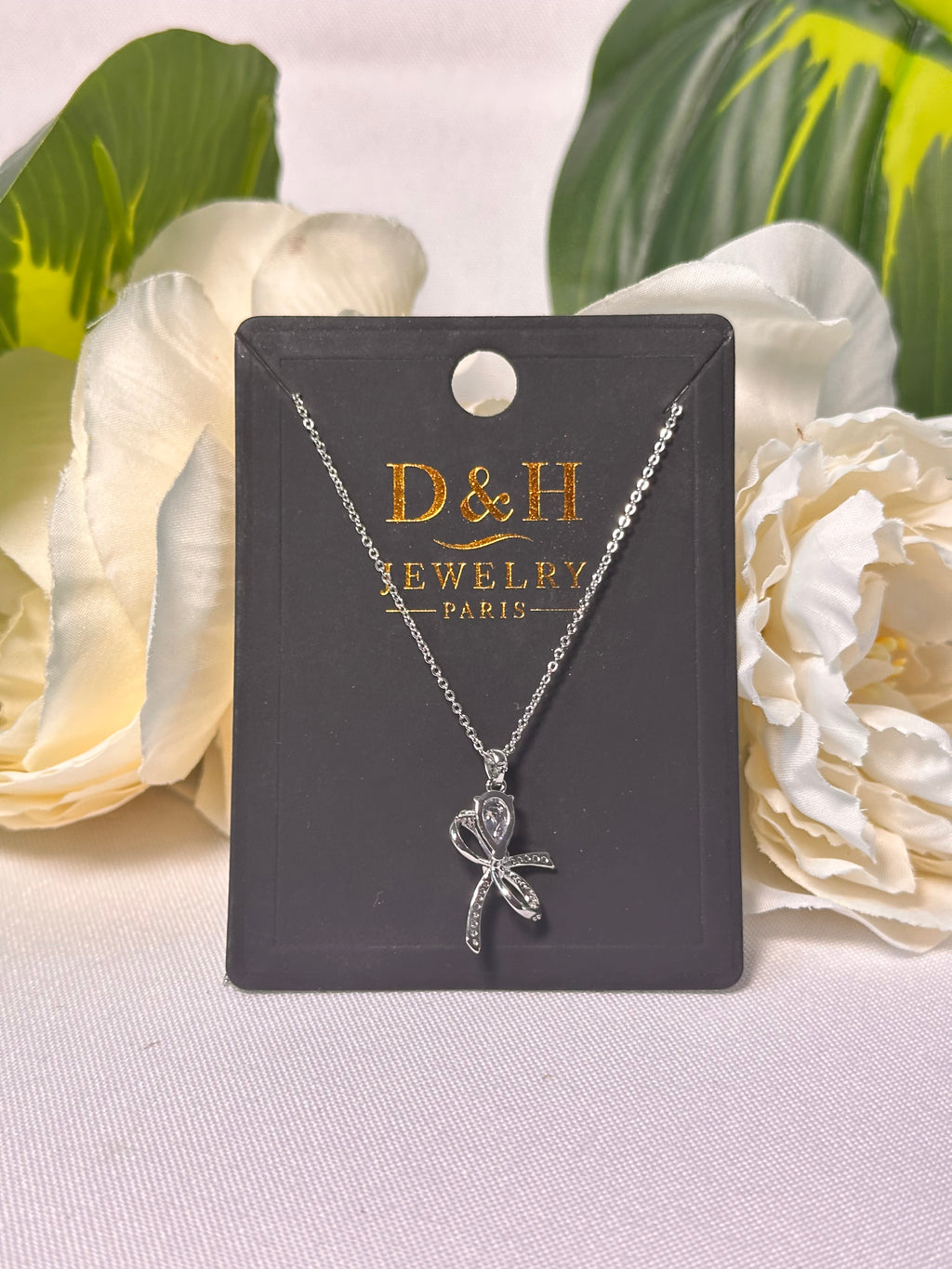 Collier Nœud Élégant Argenté – D&H Jewelry Paris