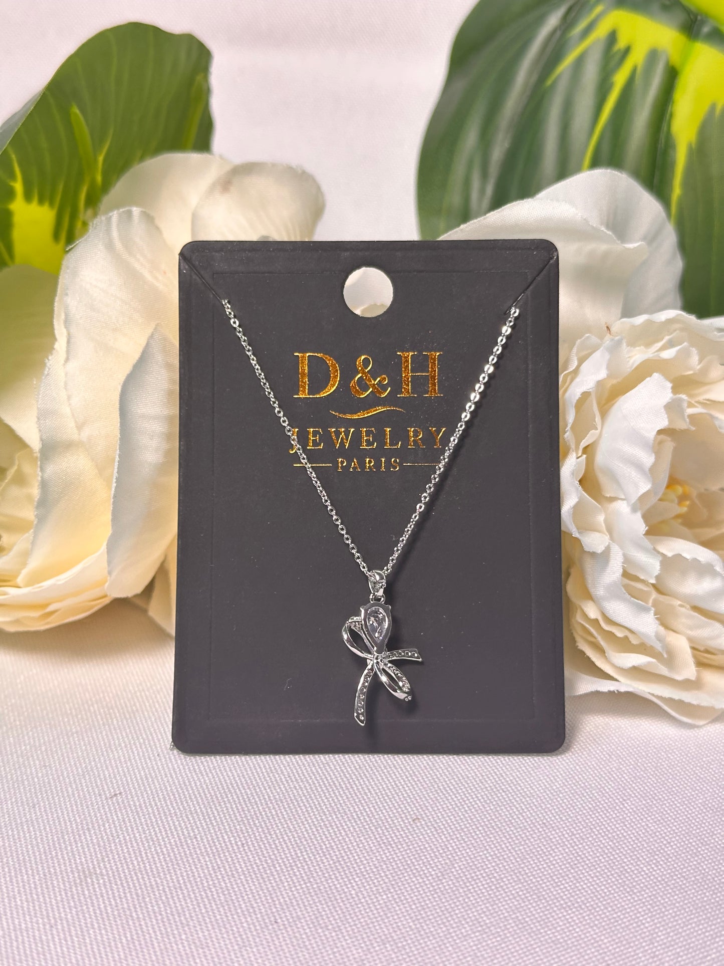 Collier Nœud Élégant Argenté – D&H Jewelry Paris
