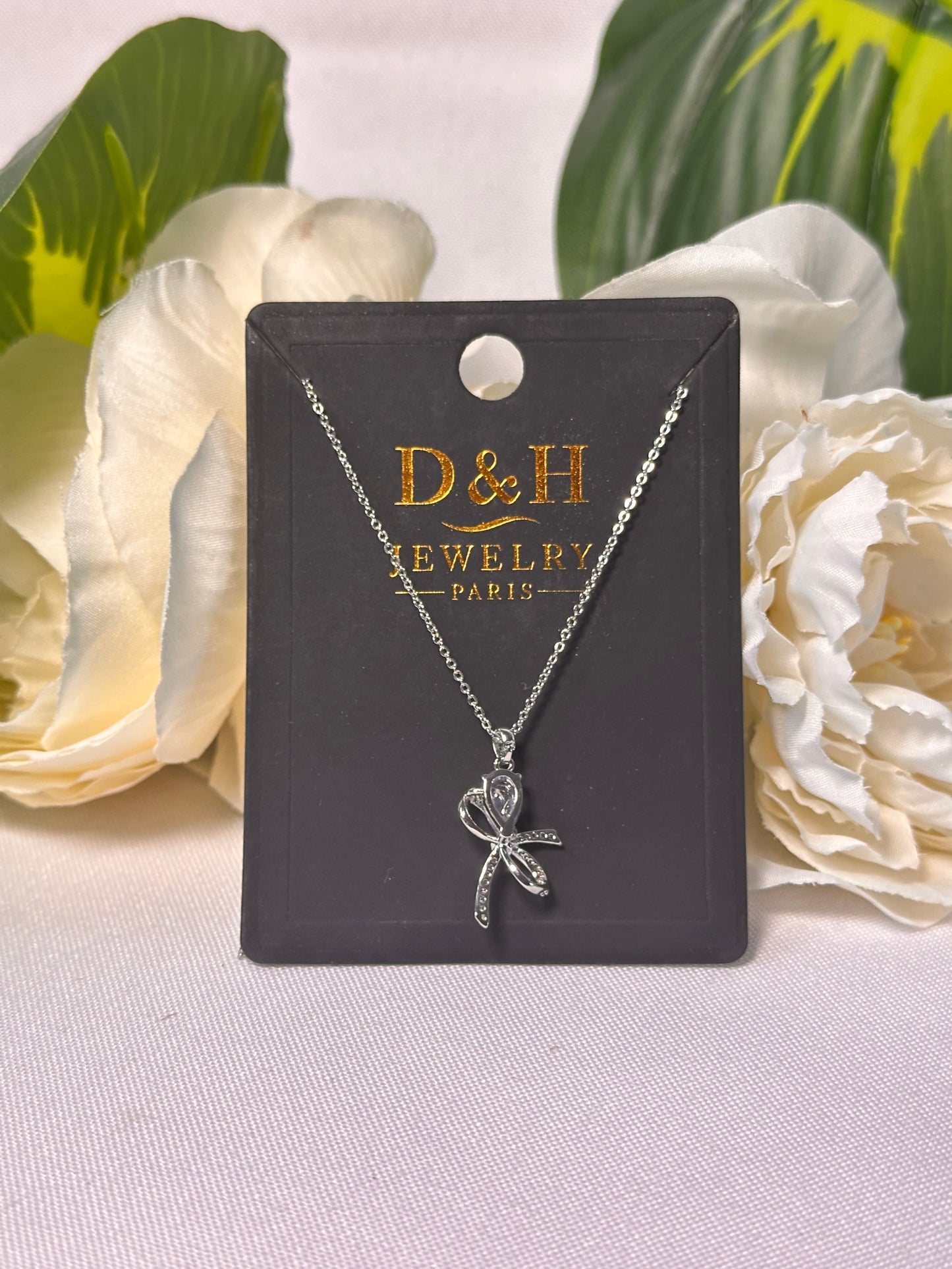 Collier Nœud Élégant Argenté – D&H Jewelry Paris